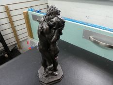 Bronze effect model of a couple embracing