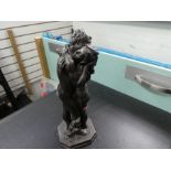 Bronze effect model of a couple embracing