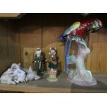 A group of Lladro pigs three Beswick pig figures and a Jema parrot