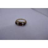 9ct garnet and seed pearl gypsy ring, marked 9ct, 2.6 g approx., size M.