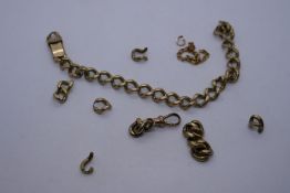 9ct yellow gold curb link bracelet, marked 375, AF, in pieces, 9ct gold clasp and unmarked yellow me