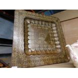 A large square hand engraved Middle Eastern brass tray