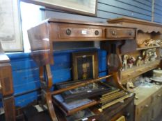 A reproduction yew wood soda table having two drawers on splay legs