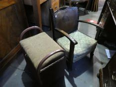 A Lloyd Loom style laundry basket and an oak low chair