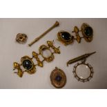 Box of costume jewellery to include gilt agate set bracelet, yellow metal pendants, brooches etc