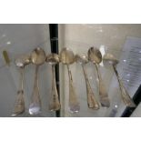 Seven very heavy silver serving spoons, all look identical, four hallmarked London 1911 James Ramsay