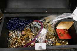 Oriental style jewellery box containing necklaces, cufflinks, large Celtic pendant set gemstones etc