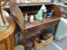 An antique mahogany cylinder Bureau having 2 drawers on square tapered legs, 102cm