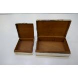 Two silver nice patterned cigarette boxes, one larger hallmarked London 1947, possibly Padgett and B