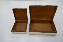 Two silver nice patterned cigarette boxes, one larger hallmarked London 1947, possibly Padgett and B
