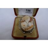 14k yellow gold mounted cameo brooch depicting a lady in evening wear her neck hung with a necklace