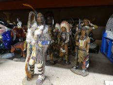 A selection of Native American Resin figures.