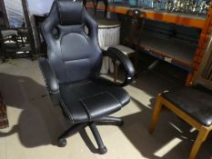 A modern black leather computer chair