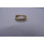 9ct yellow gold crossover design ring with 11 Channel set diamonds, Size O, Approx. 3g, Marked 375.