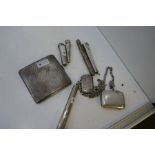 A lot comprising a silver Chatelaine with a silver cheroot holder with gold top