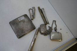 A lot comprising a silver Chatelaine with a silver cheroot holder with gold top