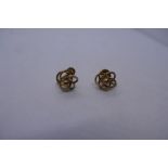 Pair of 9ct yellow gold screw on earrings marked 375, marked 9ct, approx. 4.1g.