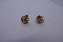 Pair of 9ct yellow gold screw on earrings marked 375, marked 9ct, approx. 4.1g.