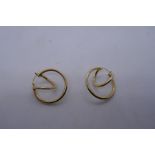 Pair of 14K yellow gold dress earrings, marked 14K, 3cm diam. 2.2g