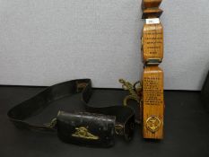 A Victorian Royal Artillery black leather pouch, with strap and a French Oak Naval finial