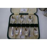 A cased set of six silver teaspoons hallmarked Sheffield 1958, Viners Ltd. Also with two engine turn