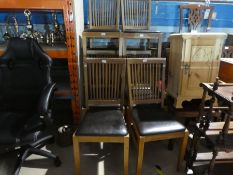 A set of eight modern oak dining chairs