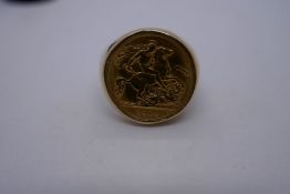 1914 Half Sovereign, in a 9ct gold mount, marked 9ct, 11.6g approx.