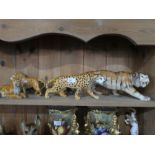 A Beswick Leopard and three other wild cats