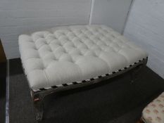 A modern French style footstool having buttoned top (104cm)