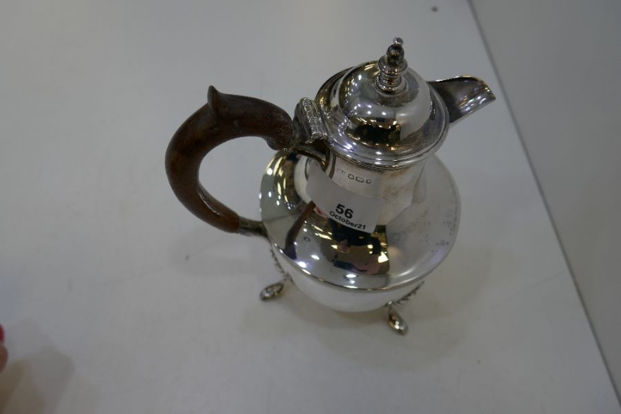 A silver Victorian small hot water jug on three pretty feet and wooden handle. Nice handle. Hallmark - Image 4 of 4