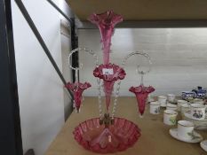 A Victorian Cranberry glass epergne with 3 trumpets and 2 baskets, 49cm