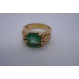 Unmarked Art Deco rose gold signet ring, set with rectangular cut emerald, approx 3.13ct – unmarked