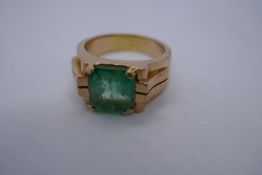 Unmarked Art Deco rose gold signet ring, set with rectangular cut emerald, approx 3.13ct – unmarked