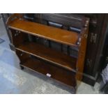 A Victorian mahogany hanging wall shelf with pierced decoration