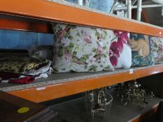 A quantity of floral cushions and sundry