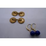 Pair of 18ct backed cufflinks set with jet panels together with pair of 14K yellow gold earrings eac
