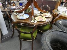 A Victorian mahogany circular dining table on carved tripod base with set of five Victorian balloon