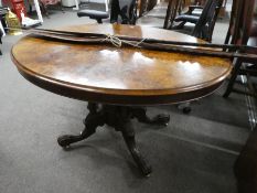 A late Victorian burr walnut oval loo table on carved quadrapod base (120cm).