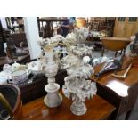 A pair of Alabaster urns and a marble three tier centrepiece decorated birds (AF)