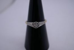 9ct gold dress ring with illusion set diamond and floral engraved shoulders, size N