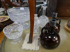 An old cut glass footed bowl, other cut glass items and a pair of brown glass decanters