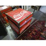 A Coca Cola trunk containing pastimes