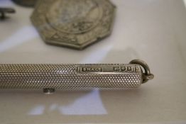 A lot comprising of silver pencil cover silver broch and pendant, cut glass silver topped jar and ot