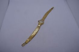 18ct yellow gold ladies 'Omega' wristwatch marked 750; 16cm, approx. 27.9g