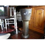 Vintage brass ice bucket on stand