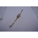 Vintage 9ct yellow gold ladies wristwatch, case marked 9ct, DS on plated strap, 14.2g gross weight.