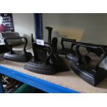 Collection of cast irons, doorstops and a shoe last