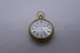 18ct yellow gold ladies fob watch, marked 18c – 88239 – with enamel dial and Roman numerals, circa 1