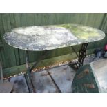 Vintage marble top table on floral decorated cast iron base