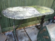 Vintage marble top table on floral decorated cast iron base